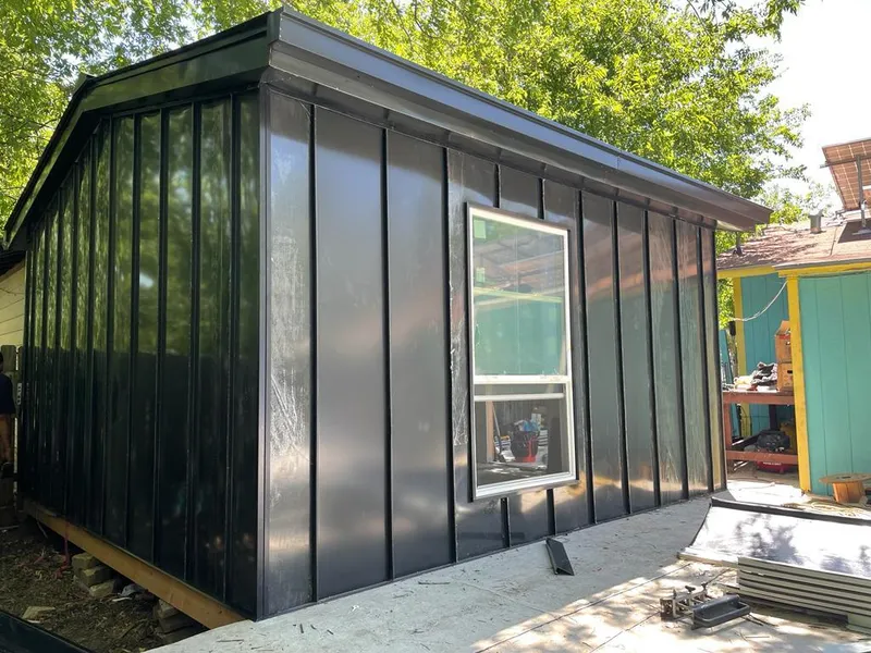 Black standing seam metal wall panels for Metal Roof Installation in North Platte